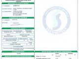 un gros plan d'un document sur lequel figure la photo d'une personne