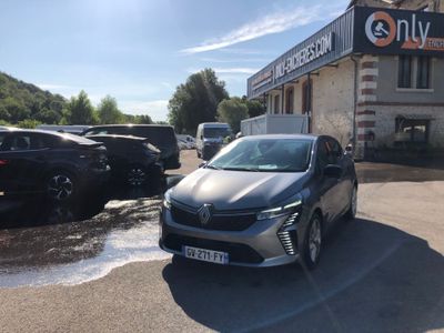 a car parked in front of a building in a parking lot