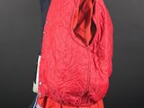 an image of a red jacket on a mannequin stand