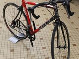 a bike that is sitting on a stand in a store