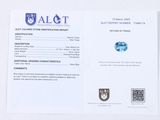 a close up of a piece of paper with a blue diamond on it