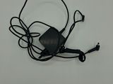 a close up of a black cord with a charger attached to it
