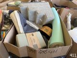 a box full of items that are sitting on the floor