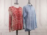 two women ' s shirts on a mannequin stand in front of a white wall