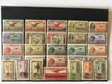 a collection of stamps from different countries on display in a black frame