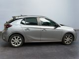 a picture of a silver car parked in a garage