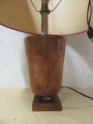 a lamp that is sitting on a table with a lamp on it