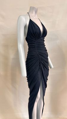 an image of a mannequin dressed in a black dress