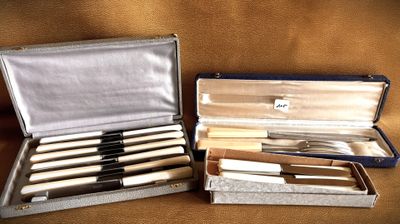 a lot of knives in a case on the table