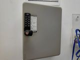 a picture of a metal box with a key lock on it