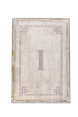 an old picture of a white square with a cross on it