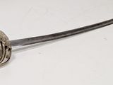a sword that is sitting on a table