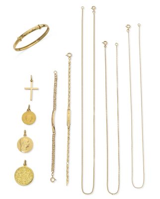 a collection of gold jewellery including a necklace, bracelet, and ring