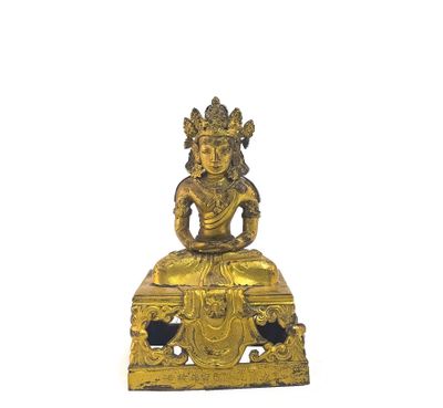figurine en laiton représentant un Bouddha assis, sur un socle noir