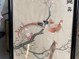 a picture of a picture of a bird on a branch