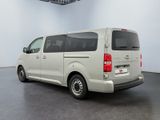 an image of a white van parked in a room