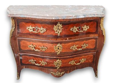 a marble top chest of drawers with a marble top