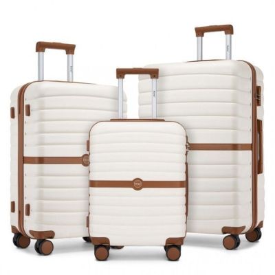 three pieces of luggage sitting on top of each other on wheels