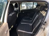 the back seats of a car are empty in the parking lot