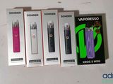 three boxes of electronic vapors sitting next to each other on a table
