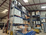 a large warehouse filled with lots of boxes and pallets