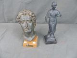 a statue of a woman and a statue of a man
