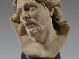 buste en marbre représentant un homme aux cheveux longs et à la barbe fournie