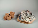 a piece of bread and a piece of chocolate on a table