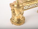 a gold bench with a clock on top of it
