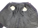 an image of a black skirt with a pair of shoes next to it