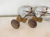 pair of antique brass plated wall lights with glass shades