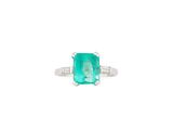 an emerald and diamond ring