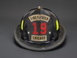 firefighter ' s helmet with the number 19 on it
