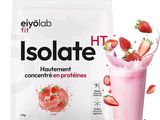 an image of a strawberry milkshake in a glass next to a bag of isolate