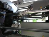 an image of a machine that is working on a piece of paper