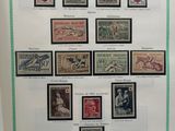 an image of a picture of a collection of stamps on a wall