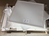 a lot of pieces of white furniture on a pallet