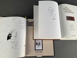 a book opened to show a drawing of a man and a woman