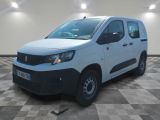 the white van is parked on a checkered floor in a room