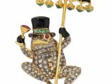 une image représentant une grenouille coiffée d'un haut-de-forme et tenant un parapluie