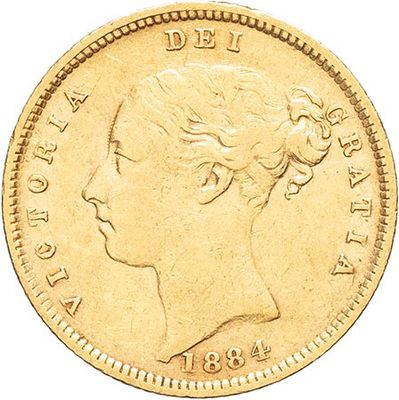 a close up of a gold coin on a white background