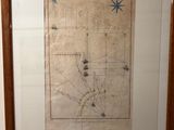 a picture of a picture of a map hanging on a wall