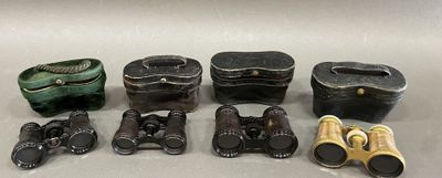 several different types of binoculars are lined up on a table