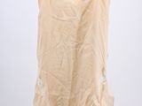 an image of a women ' s top hanging on a hanger