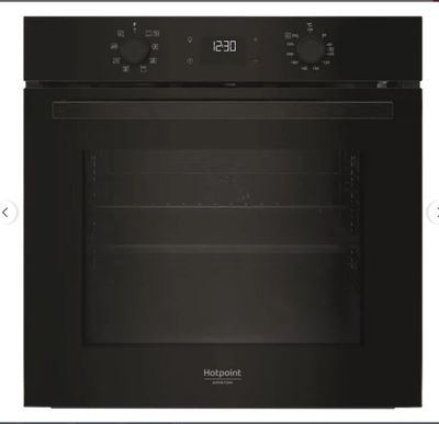 a black oven with the door open on a white background
