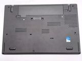 a close up of a laptop with a blue sticker on it