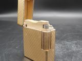 a box that has a lighter in it on a table