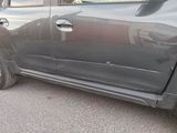 a picture of a car parked on the side of the road