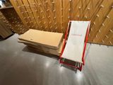 a stack of cardboard sitting on the floor in a room