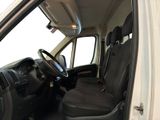 a white van with black seats and a steering wheel
